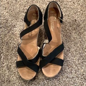 Tom’s black strappy wedges